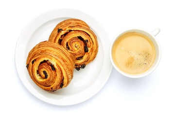 two fresh cinnabones and coffee on white background