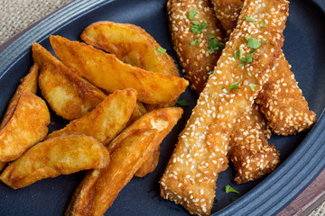 Details of fresh fish and chips on a plate
