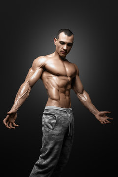 Strong Athletic Man Fitness Model Torso showing big muscles