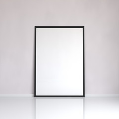 Mock up blank poster picture frame near the wall in a room, 3D rendering