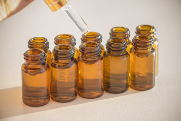 Pipette in hand with small test tubes