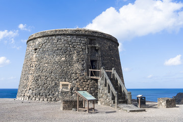 Landmark, fortified tower in the fishermen village El Cotillo on