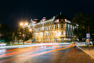 Vilnius Lithuania. Kempinski Hotel Cathedral Square In Bright Night Illumination On Universiteto Street