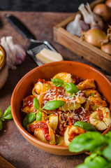 Homemade tortellini with tomato sauce