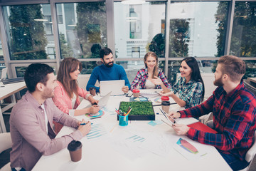 Fototapeta premium Portrait of successful young businesspeople working in office