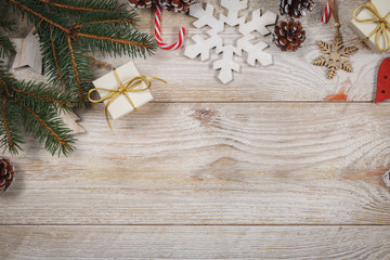 Christmas decorations on wooden table. View from above.