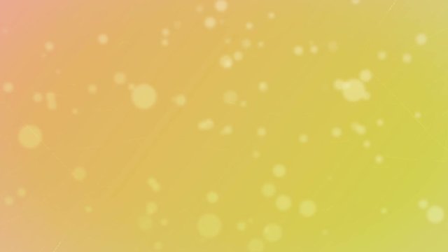 Background of circular particles, in warm yellow tones. The movement of lines lengthwise of the background.