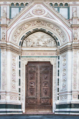 Entrance of Santa Maria del Fiore cathedral in Florence, Italy