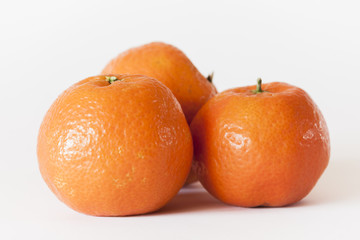 Tangerines on white table
