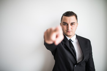 Sad business man pointed tirh finger on you.