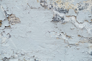 texture Close Up of Chipped blue peeling paint, covered with cru