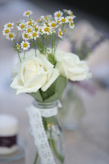 White roses bouquet for wedding tables