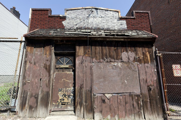Abandoned, decrepit shack eyesore.