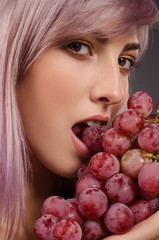 girl with a glass and grape vine