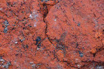 damaged red brick , texture