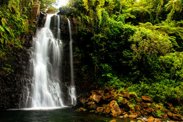 Fototapeta na wymiar Middle Tavoro Waterfalls in Bouma National Heritage Park, Taveun