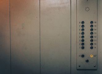 Lift or Elevator buttons and wall inside interior with copy space