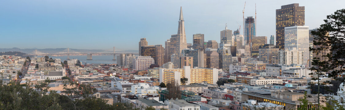 San Francisco Downtown and Bay Bridge Panorama. Aerial views from Russian Hill neighborhood.
