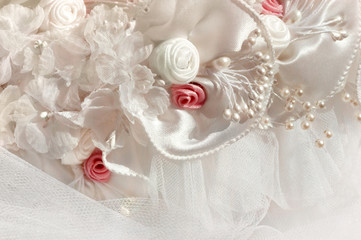 Fototapeta na wymiar Detail from pink and white bridal veil and headdress