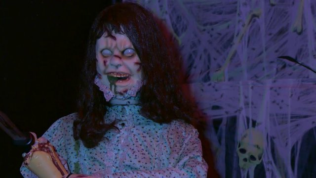 Demonic doll night medium shot