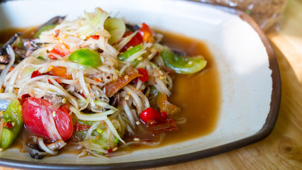 spicy papaya salad with salted crab and fermented fish