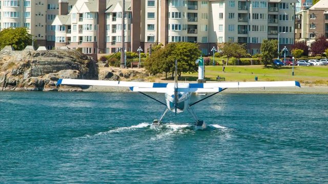 Sightseeing Seaplane Unmarked Rear Closeup in Victoria BC Inner Harbour as it Departs on an Excursion