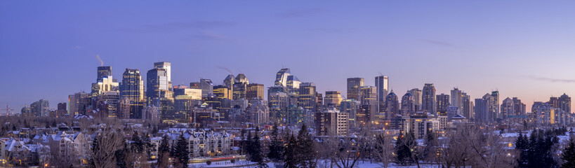 Fototapeta na wymiar Sweeping skyline view at sunset in Calgary, Alberta. Calgary is home to many oil companies. 