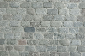 Old grey stone pavement background texture