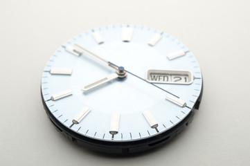 Detail of watch machinery on the table.