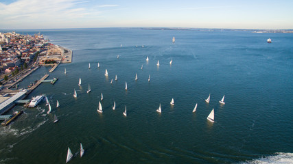 Yachts in the water around the pier aerial view