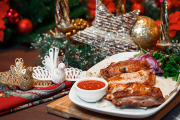 Fototapeta na wymiar Christmas dinner table with meat and sauce