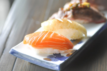 salmon sushi , rice topped with raw fish (Japanese food)