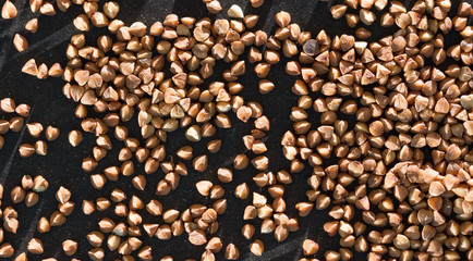 buckwheat on a black background