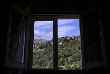 Looking the forest through the window. Photo taken in Somiedo Nature Reserve, Principality of Asturias, Spain