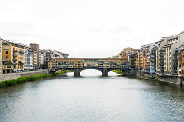 Obraz premium Ponte Vecchio in Florence Italy, Bridge with Shops, Arno