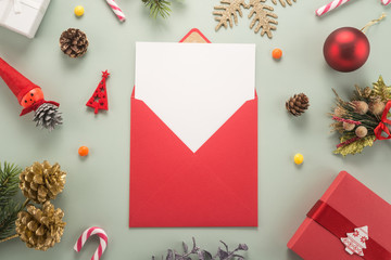 Fototapeta na wymiar Red envelope on christmas holiday background 