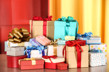 Set of gift boxes on color background