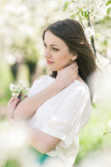 Outdoor Portrait of a Beautiful Brunette Woman in Color dress am