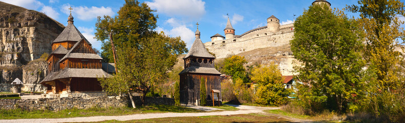 View of the old wooden church and a castle in Kamenetz Podolsky, Ukraine, Europe
