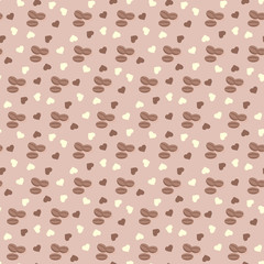 Seamless background with coffee grains and hearts