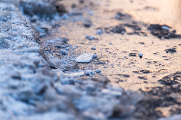 frozen puddle in the morning as a background