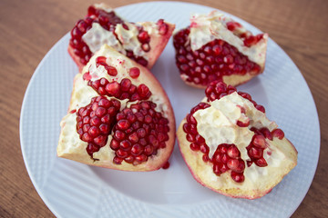 Pomegranate on the sea background.