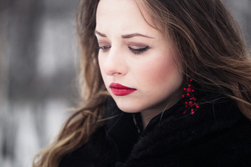 Winter portrait of a girl with long hair