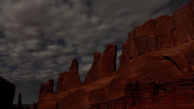 Park Avenue at Arches National Park Moonlit with Stars and Clouds Night Scene Timelapse