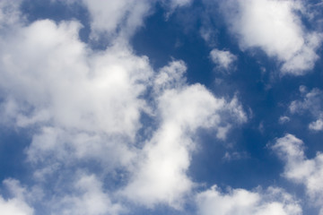 clouds in the blue sky as background