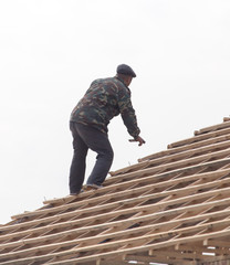 workers working on the roof