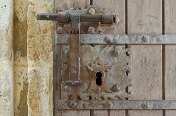 Antique door lock in the Castle of Porto de Mos. Portugal