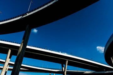 Silhouette of highway ramps on a sunny day