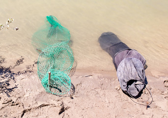 Fototapeta na wymiar fish in cages fisherman