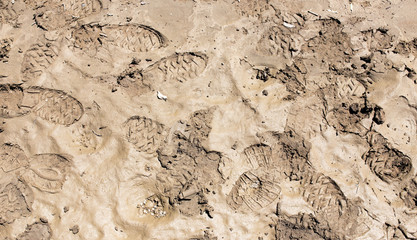 traces of the shoe on the ground as a background